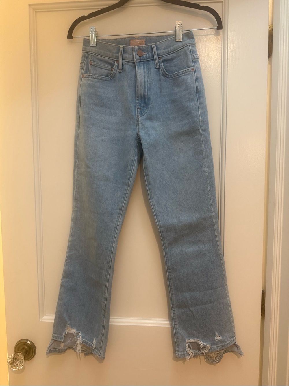 Netflix Light Blue Flare Jeans with Distressed Hem